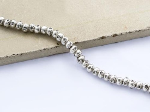 30 of Karen Hill Tribe Silver Daisy Imprint Solid Seed Beads 3.5x2.2 mm.