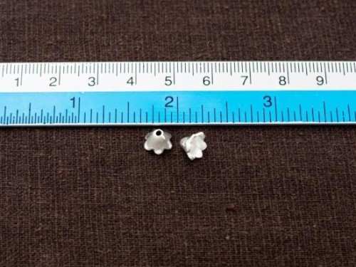 8 of Karen Hill Tribe Silver Flower Bead Caps 5x7 mm.